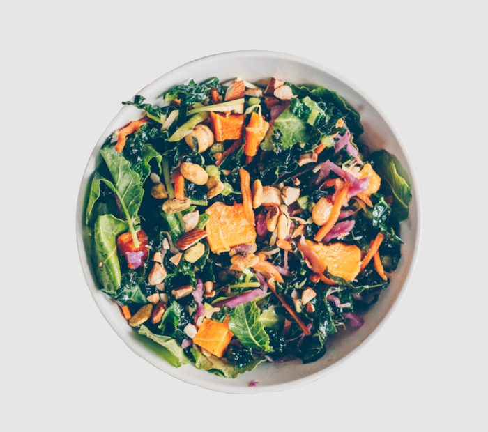 picture of a salad with leafy greens showing what to eat for fertility